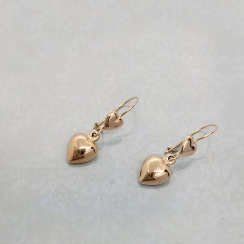 Aretes colgantes de Oro 18k doble corazon